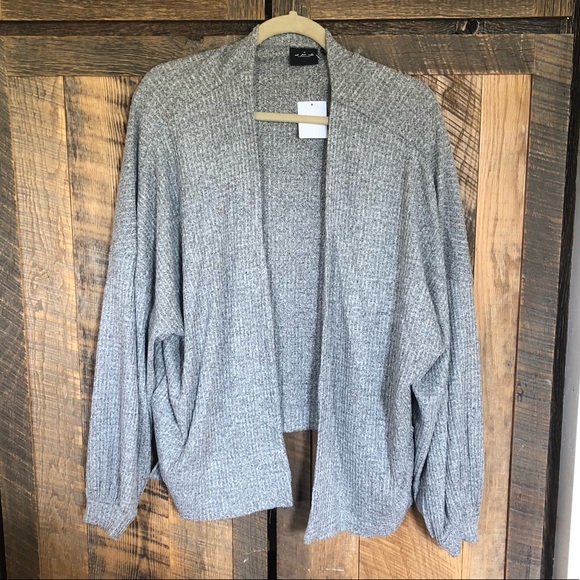 Urban Outfitters Sweaters - New gray cardigan Urban Outfitters Sweaters - New gray cardigan